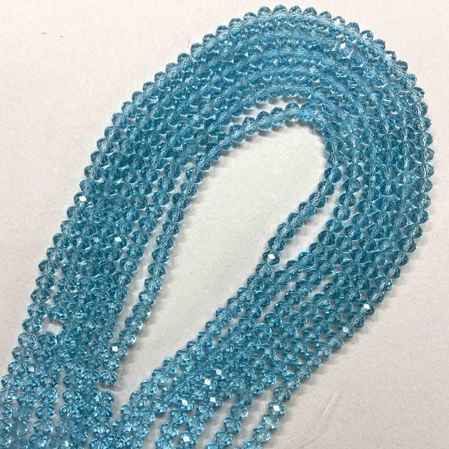 Koraliki czeskiego kryształu na nitce, niebiesko-przezroczyste fasetowane rondle, średnica 6×5 mm, długość 40–42 cm