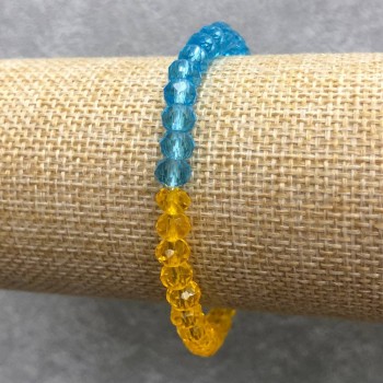 Bransoletka na gumce z czeskiego kryształu „Ukraina” fasetowane rondelki, średnica 6×4 mm, długość 18 cm