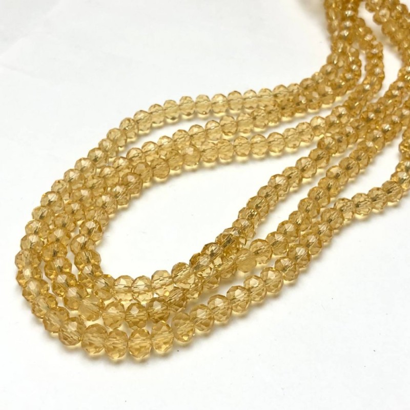 Koraliki czeskiego kryształu na żyłce, żółto-miodowe, przejrzyste, fasetowane rondelki, średnica 8x6 mm +/-, długość 40-42 cm +