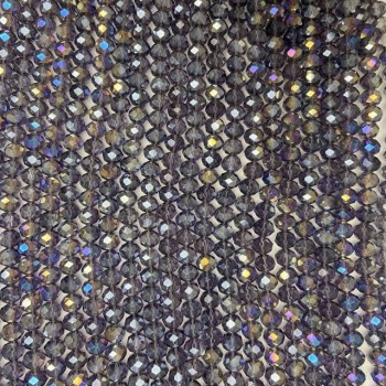 Koraliki czeskiego kryształu na żyłce, fioletowo-przezroczyste z napylaniem benzynowym, fasetowane rondelki, średnica 8 x 6,5 mm, długość 40-42 cm