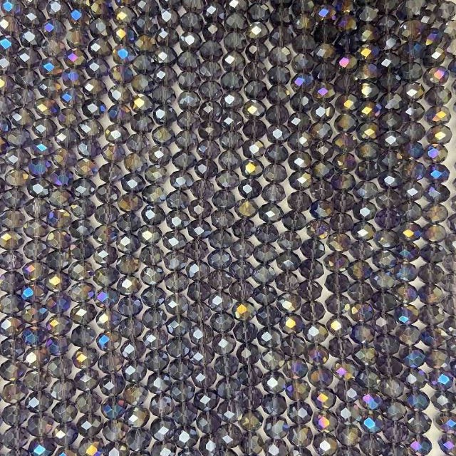 Koraliki czeskiego kryształu na żyłce, fioletowo-przezroczyste z napylaniem benzynowym, fasetowane rondelki, średnica 8 x 6,5 mm, długość 40-42 cm
