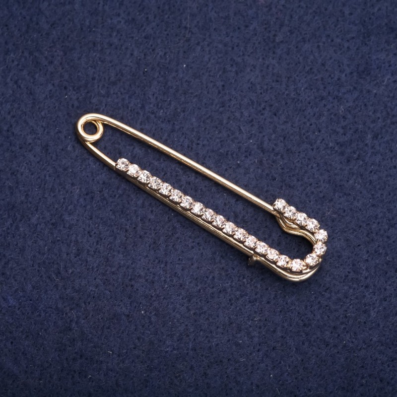 Broszka-spinka z białymi cyrkoniami 57×13 mm żółtego metalu