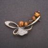 Broszka z naturalnym kamieniem – tygrysie oko – Gałązka, kolor metalu: brąz, 58×36 mm