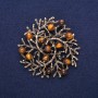 Broszka-wisiorek „Gałązki” z naturalnym kamieniem Oko Tygrysa, metal złocisty 60 mm