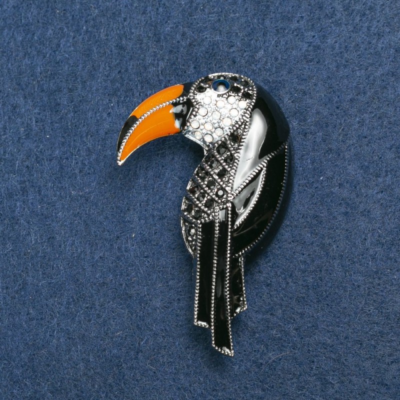 Broszka Tukan srebrzysty metal, emalia i cyrkonie 36×16 mm +