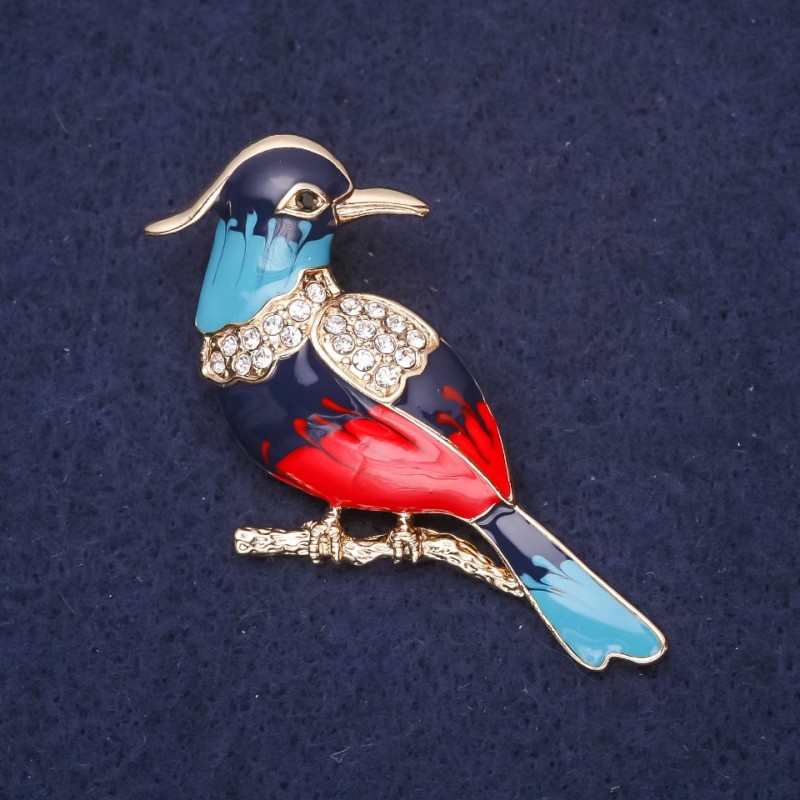 Broszka 'Ptak Ibis' kolory: błękitny, niebieski, czerwony i biały, 45×25 mm, metal złocisty
