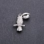 Broszka Tukana z białymi kryształami, 32×20 mm, biały metal