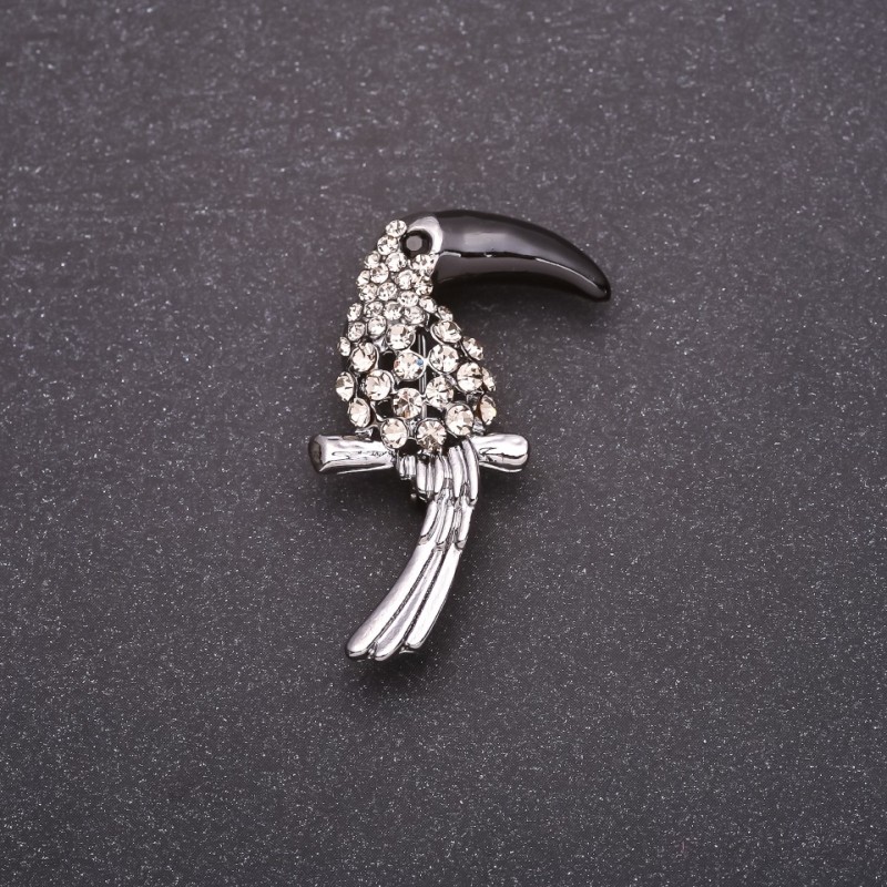 Broszka tukana z białymi kryształami, czarny dziób 38×23 mm, szary metal