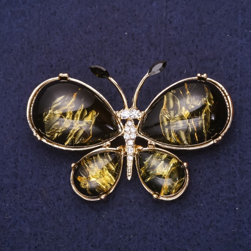 Broszka Motyl z białymi kryształami i imitacją bursztynu (sztuczny) 56×36 mm żółty metal