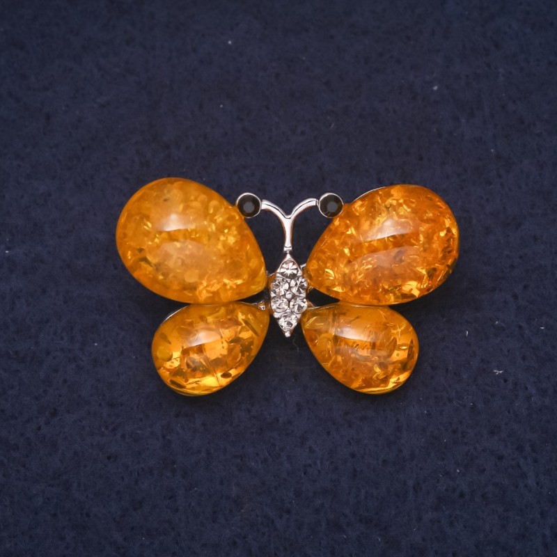 Broszka bursztynowa Motyl (sztuczny) 38×24 mm kolor żółty metal srebrzysty