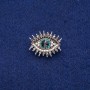 Broszka Oko w cyrkoniach, srebrzysty metal, 21×26 mm