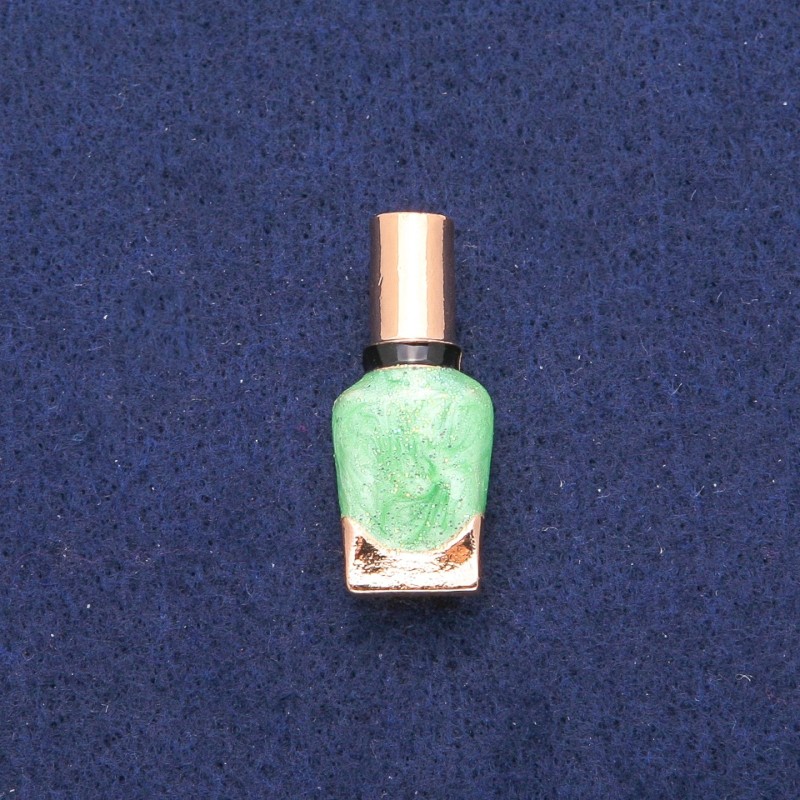 Broszka Lak – zielona i czarna emalia, złocisty metal 13×33 mm