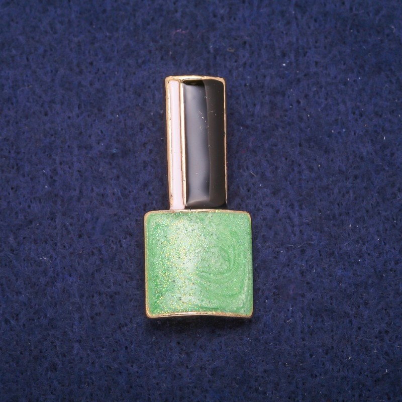 Broszka Lak – zielona, czarna i biała emalia, złoty metal 18×39 mm
