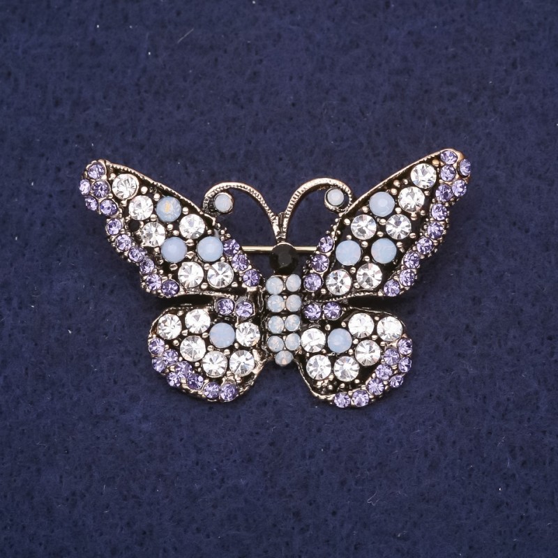 Broszka «Motyl» z błękitnymi kryształkami 28×47 mm, srebrzysty metal