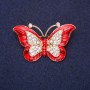 Broszka Motyl z czerwonej emalii i białymi kryształami, 45×28 mm, żółty metal