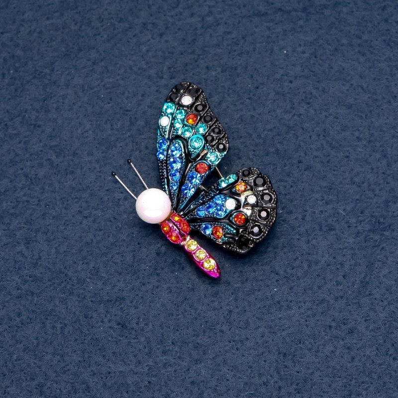 Broszka "Motyl" różnobarwne kryształy 40×33 mm seria owadów kolor metalu "srebro"