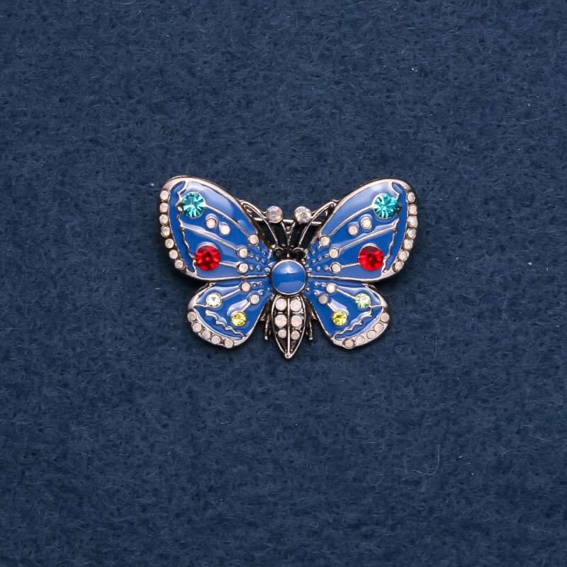 Broszka „Motyl” niebieska emalia 25×38 mm, kolor metalu „złoto”