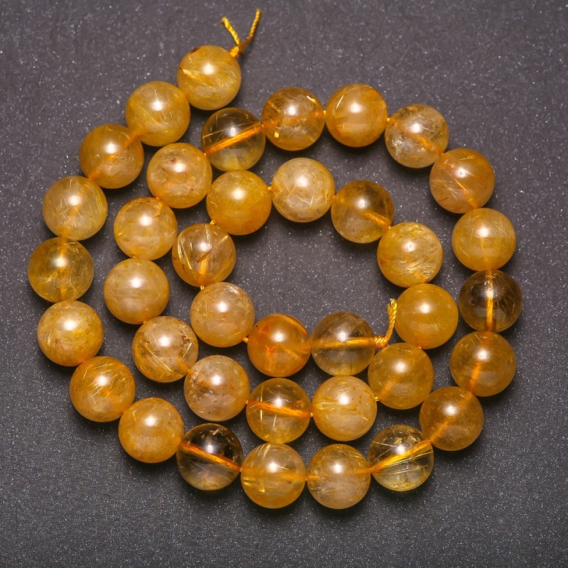 Koraliki z kwarcu rutylowego, gładkie kuleczki, średnica około 10 mm, długość 38 cm