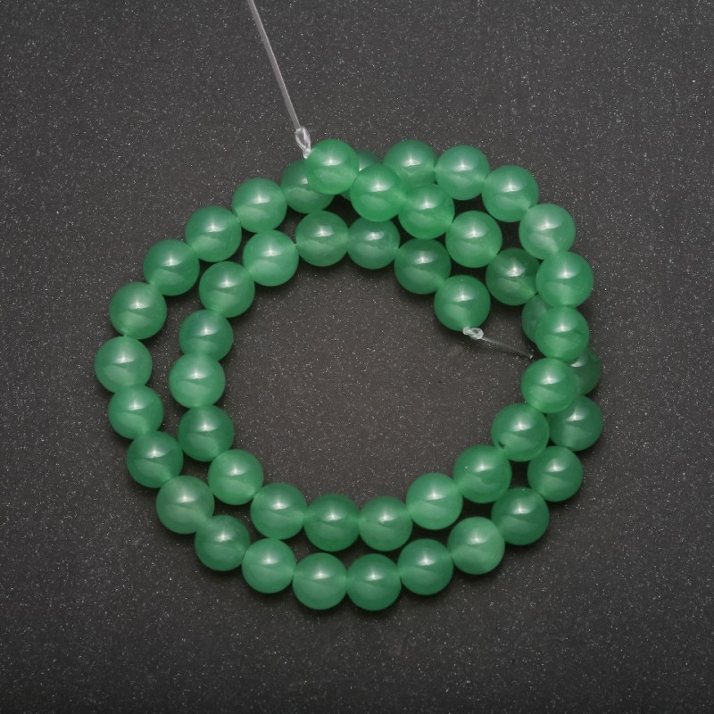 Koraliki z nefrytu na żyłce, gładkie kuleczki, średnica 8 mm (+/-), długość 38 cm