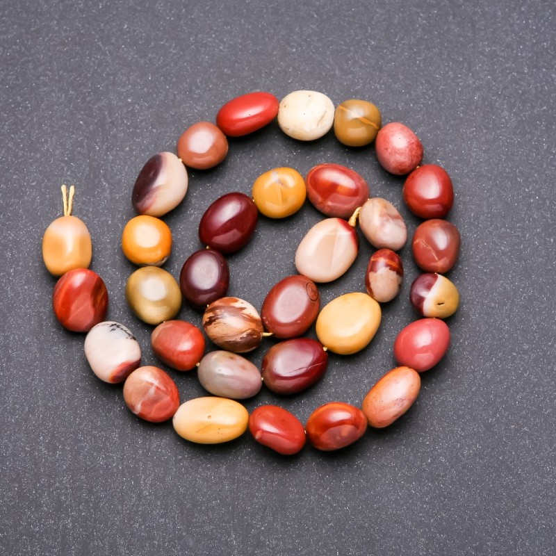 Koraliki z jaspisu Mookaite fasetowane, średnica 8×10 mm, długość 38 cm