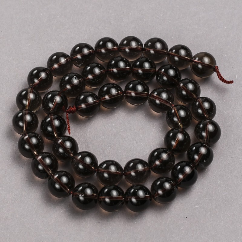 Koraliki na nici z naturalnego topazu dymnego, kulka gładka, średnica 10 mm, długość 39 cm
