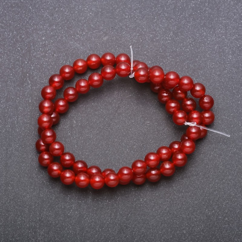 Koraliki z naturalnego kamienia – karneol na nitce, gładka kulka, średnica 6 mm (±), długość 38 cm
