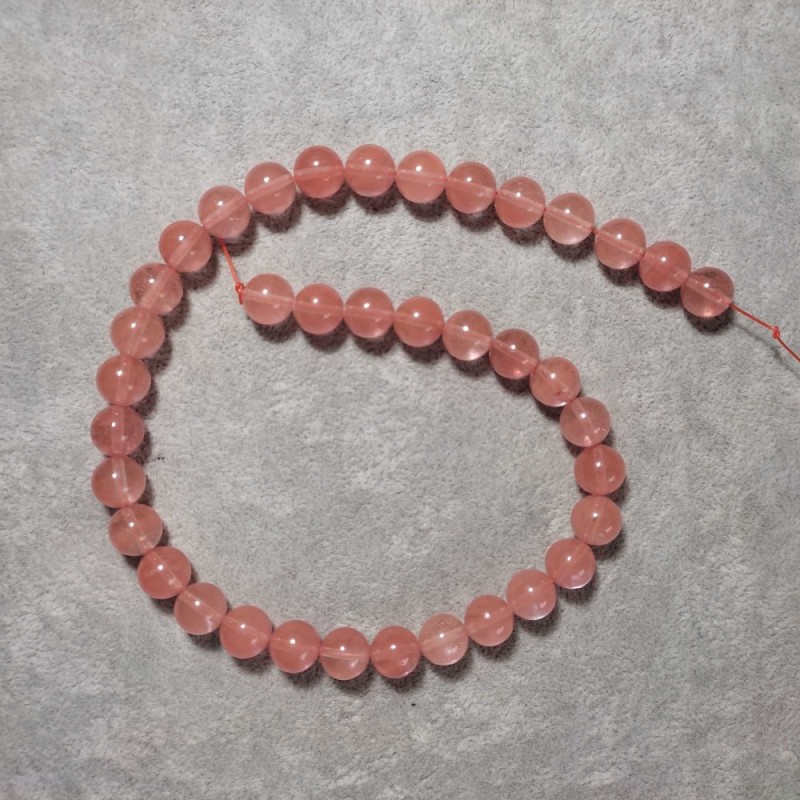 Koraliki chalcedonu sztuczne, gładkie kuleczki, średnica 10 mm, na nitce 38 cm