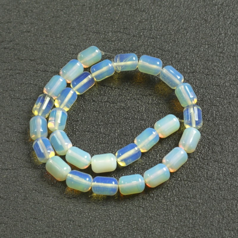 Koraliki na nitce z kamieniem księżycowym (syntetyczny) w kształcie beczki, średnica 10×14 mm, długość 39 cm