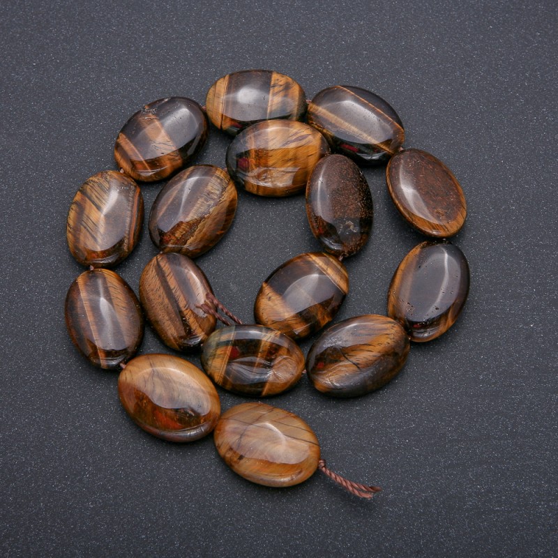 Koraliki na nici z naturalnego kamienia tygrysie oko, owalne, średnica 25×18 mm, długość 39 cm