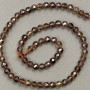 Koraliki z naturalnego kamienia rauhtopaz, fasetowane kulki, średnica 6 mm, długość 39 cm +