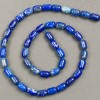 Koraliki z naturalnego lazurytu 'beczka', średnica 6×9 mm, długość 39 cm +