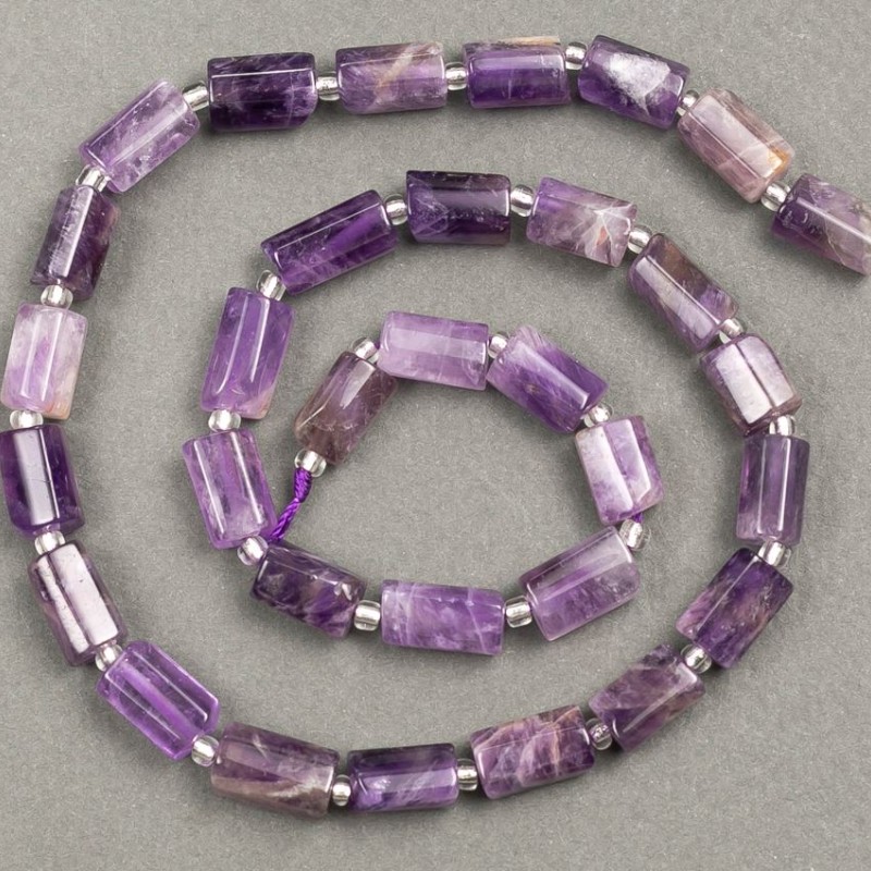 Koraliki na nitce z naturalnego ametystu fasetowane 10×6 mm, długość 39 cm ± z koralikami 3×2 mm