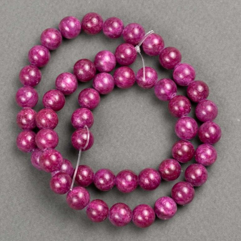 Koraliki na żyłce tonowany kwarc (sztuczny akryl) malinowy, gładka kulka, średnica 8 mm, długość 40 cm