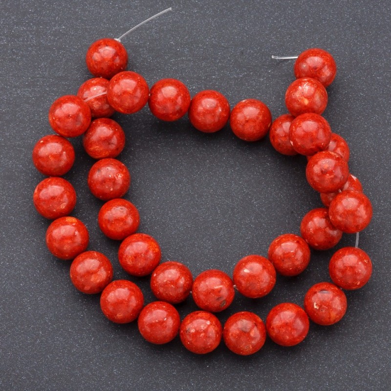 Koraliki z naturalnego koralu gąbczastego, gładkie kuleczki, średnica ok. 12 mm, długość nici 37 cm