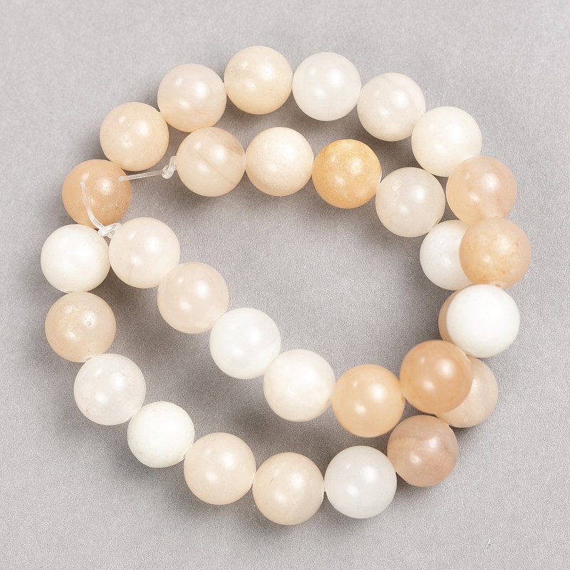Koraliki selenitu na nitce – gładka kulka, średnica 12 mm, długość 38 cm