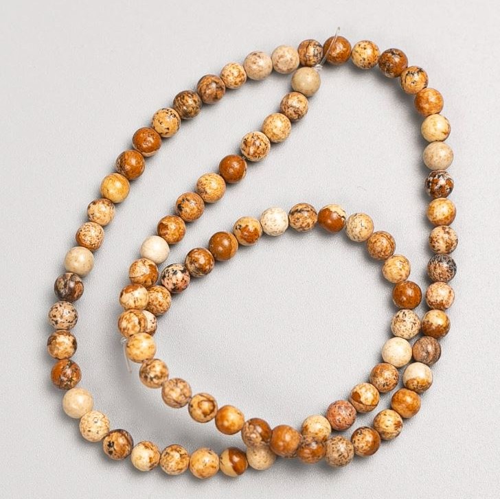 Koraliki na żyłce – pejzażowy jaspis, gładkie kulki, średnica 4–5 mm, długość około 37 cm
