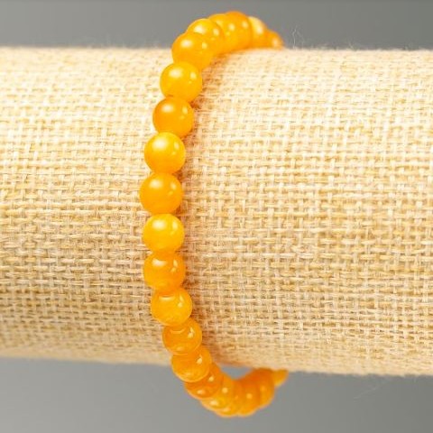 Bransoletka na gumce z imitacją cytrynu (sztuczny akryl), średnica 6,5 mm, długość 18 cm