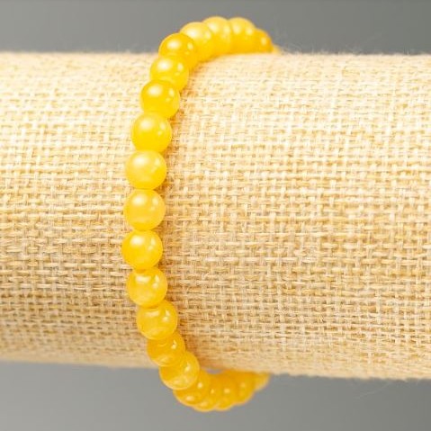 Bransoletka na gumce z imitacją cytrynu (akrylowa), średnica 6,5 mm, długość 18 cm