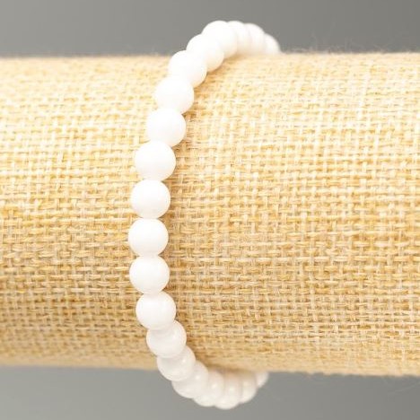 Bransoletka z białego agatu (prasowany) gładka kuleczka, średnica 6 mm, długość 18 cm (na elastycznym sznurku)