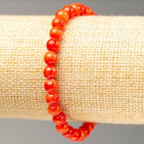 Bransoletka na gumce Koral (sztuczny akryl) gładka kulka, średnica 6,5 mm, długość 18 cm
