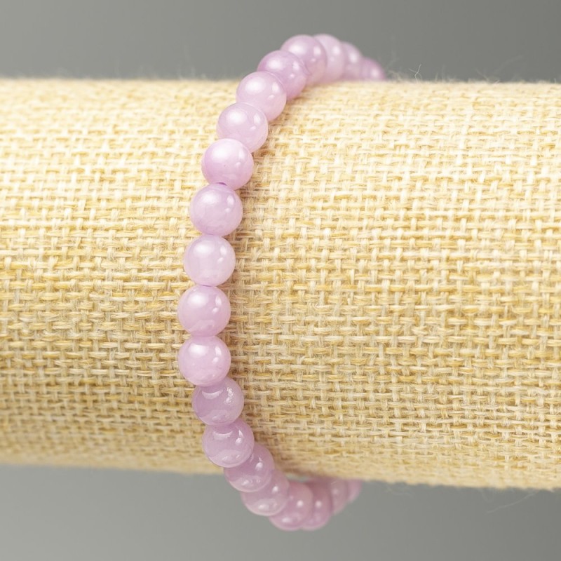Bransoletka na gumce imitująca kunzyt (sztuczny akryl) — gładka kulka, średnica 6,5 mm, długość 18 cm
