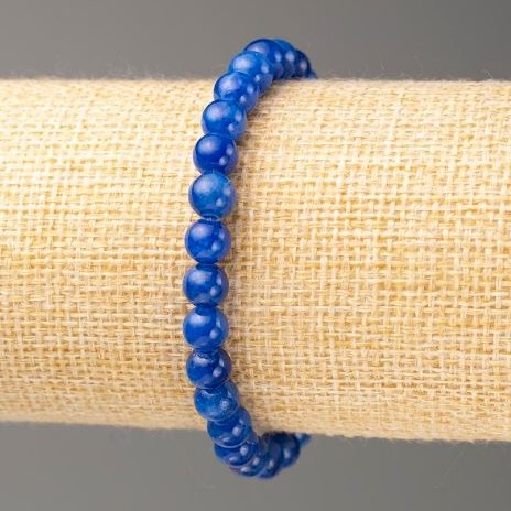 Bransoletka na gumce z lazurytu sztucznego (akryl) - gładka kulka, średnica 6,5 mm, długość 18 cm
