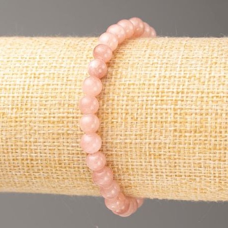 Bransoletka na gumce z truskawkowego kwarcu (sztuczny akryl) gładka kulka o średnicy 6 mm, długość 18 cm
