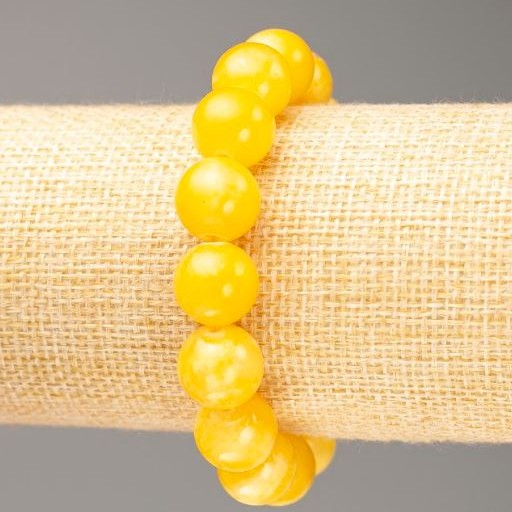 Bransoletka na gumce z imitacją cytrynu (sztuczny akryl), średnica 12,5 mm, długość 18 cm
