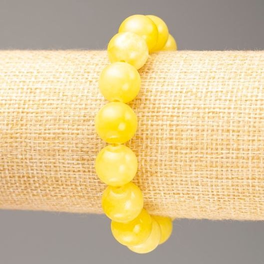 Bransoletka na gumce z akrylową imitacją cytrynu, średnica 12,5 mm, długość 18 cm