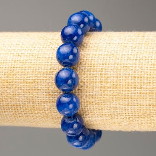 Bransoletka na gumce z imitacją lazurytu (sztuczny akryl), średnica około 12 mm, długość około 18 cm