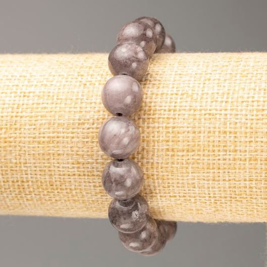 Bransoletka na gumce z tonowanego kwarcu (sztuczny akryl), ciemnoszara, gładkie kuleczki, średnica 12,5 mm, długość 18 cm