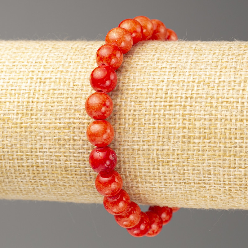 Bransoletka z czerwonego koralu sztucznego (akryl), średnica kulek 8 mm, długość około 18 cm, gładkie kuleczki na elastycznej gumce