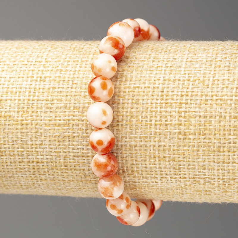 Bransoletka rudobiała oceanicznego nefrytu (sztuczny akryl), średnica 8 mm +-, długość 18 cm +-, gładka kulka na gumce