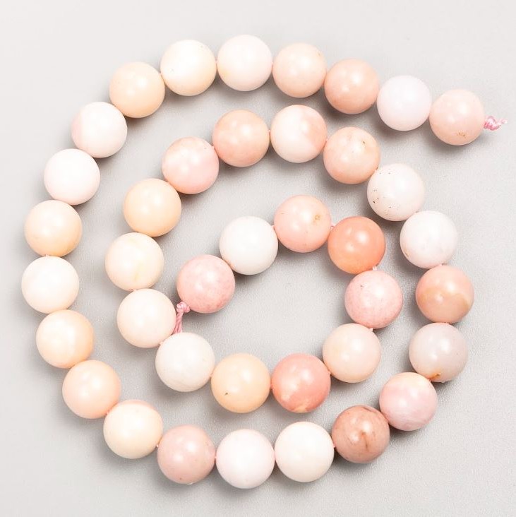 Koraliki na nitce z naturalnego kamienia – różowy opal, gładkie kuleczki, średnica 10 mm, długość 38 cm +